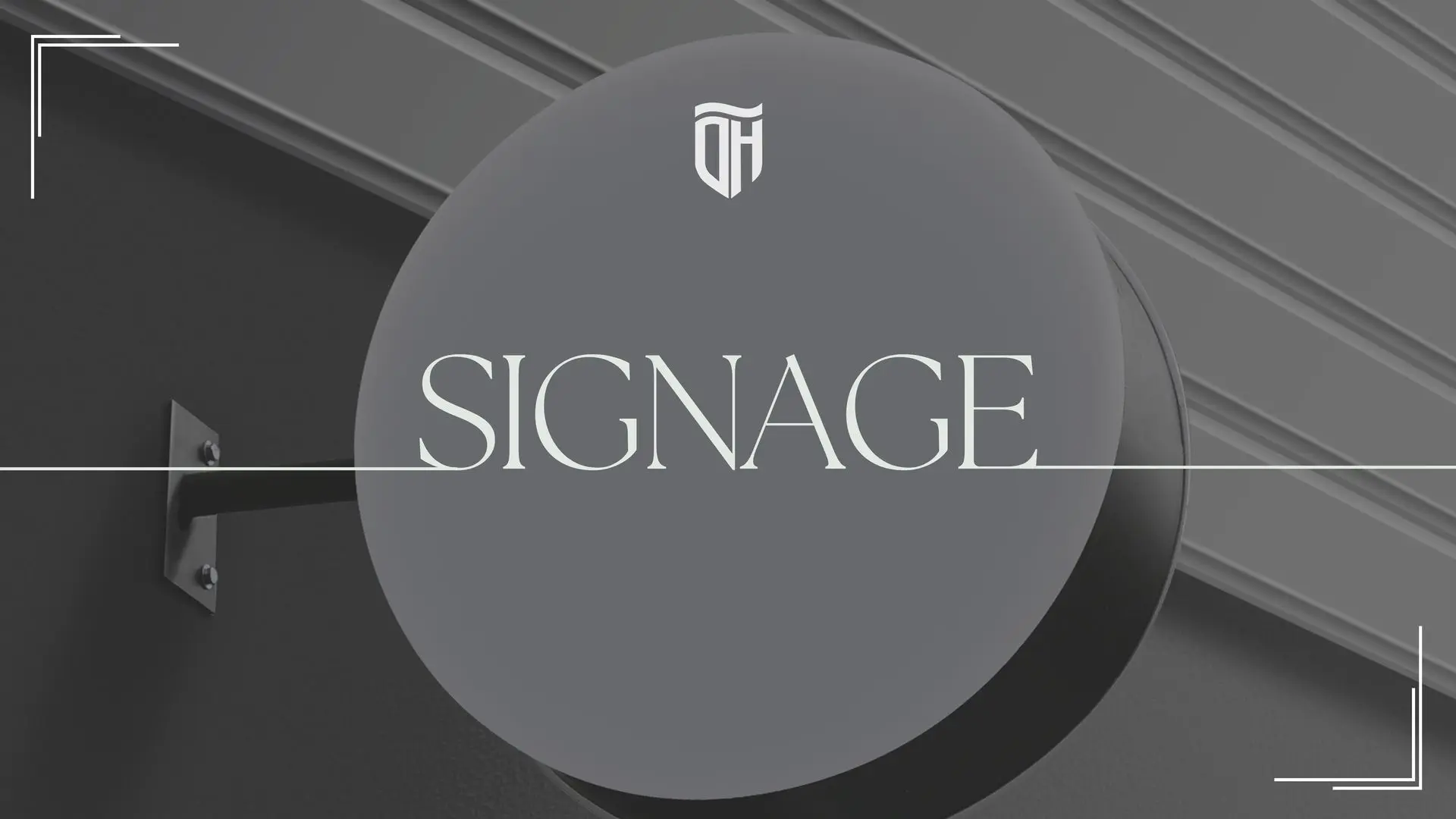 Signage banner featuring a circular gray sign