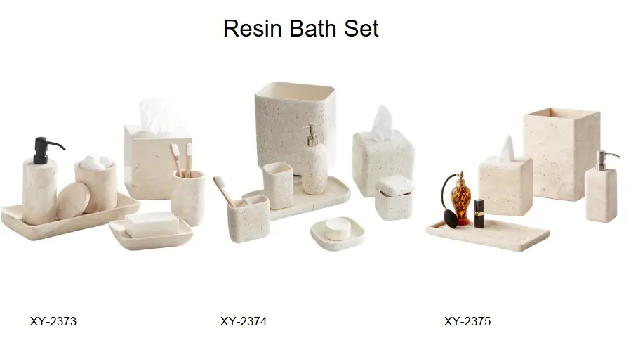 Luxury resin bathroom sets with natural beige stone and speckled travertine effects, including square wastebaskets, vanity trays, and soap dispensers with metal pumps.