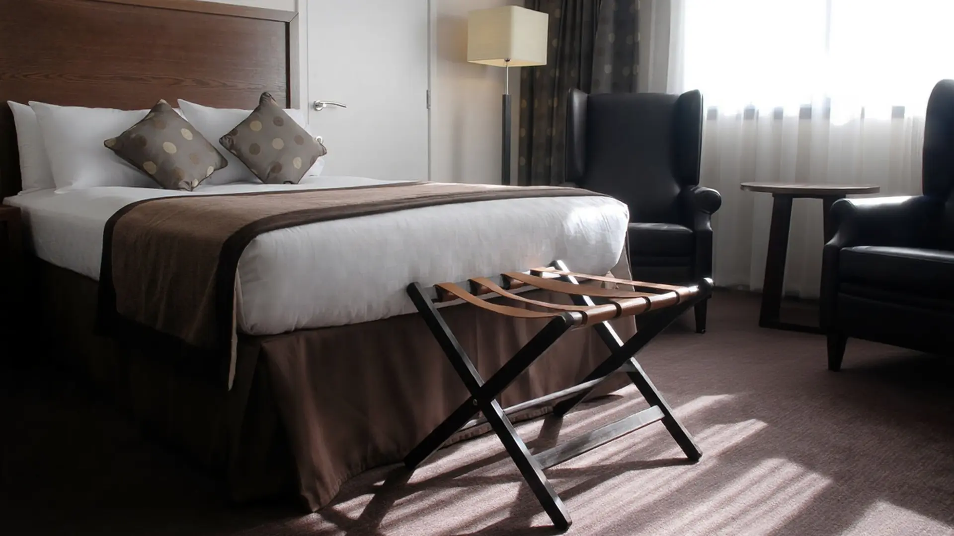 China OS&E hospitality supplies featuring a coordinated bed set and seating area.